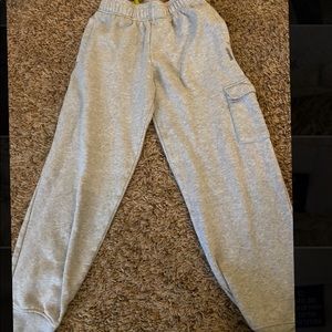 Boys light grey Reebok sweatpants with pockets